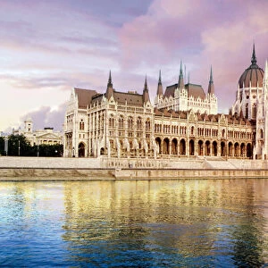 Hungary, Budapest, View of the Parliament and the Danube River at sunset