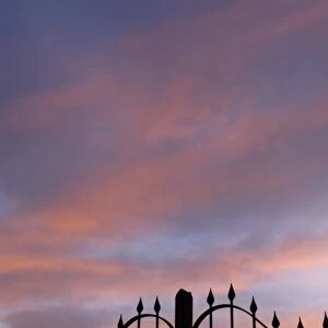 ironwork gate at sunset