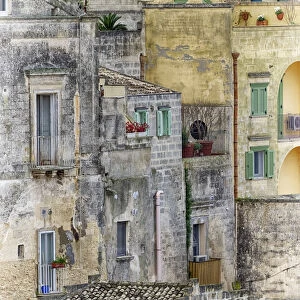 Italy, Basilicata, Matera. Balconies and windows of sassi homes in the old town of Matera