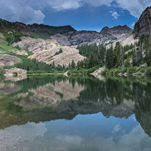 Panoramic landscape of Sundial Peak, Lake Blanche and reflection