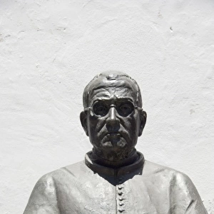 Portugal, Madeira Island, Funchal. Bronze of Dr. Francisco Andrade in front of Gothic