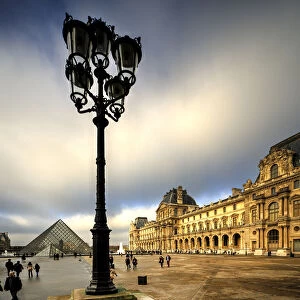 Pyramid and courtyard to the Louvre in Paris, France