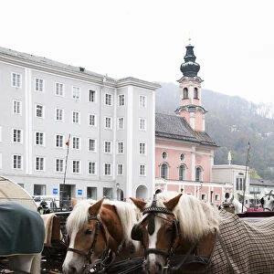 Salzburg, Salzburg, Austria - Horses and horse-drawn carriages in an old world setting