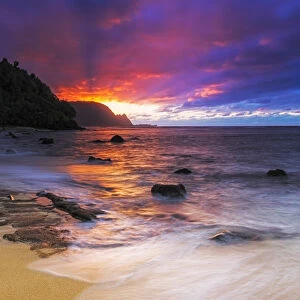 Sunset over the Na Pali Coast from Hideaways Beach, Princeville, Kauai, Hawaii USA