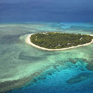 Tavarua Island and coral reef, Mamanuca Islands, Fiji, South Pacific - aerial