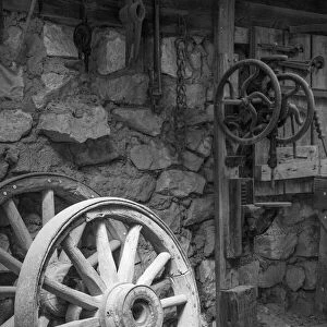 USA, California, Bishop. Black and white inside blacksmith shop at Laws Railroad Museum