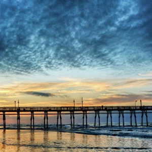 USA, North Carolina. Sunset Beach pier at sunrise