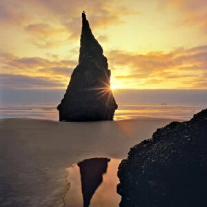 USA, Oregon. Rock formation at sunset on Bandon Beach. Credit as: Steve Terrill Photography