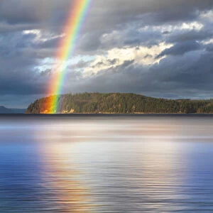USA, Washington State, Seabeck. Rainbow over Hood Canal