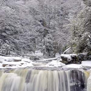 USA, West Virginia, Blackwater Falls State Park. Waterfall in winter landscape. Credit as