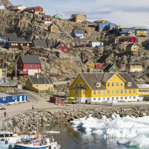 Uummannaq harbor and town, northwest of Greenland, located on an island in the Uummannaq