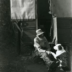 Gentleman with his dog in Bedham. September 1933