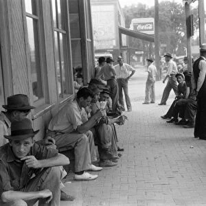ALABAMA: WORKERS, 1941. A group of men, some of them unemployed, on the main street