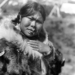 ALASKA: ESKIMO WOMAN. A Nunivak woman identified as Dahchihtok wearing nose ornament and labrets