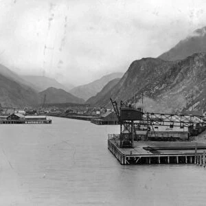 ALASKA: SKAGWAY PIERS. View of the railroad tracks and pier on the Taiya Inlet
