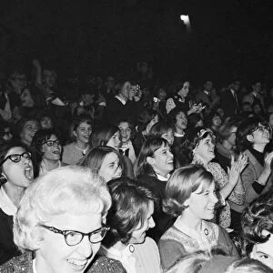 THE BEATLES, 1964. The audience at the Beatles concert at the Washington Coliseum in Washington