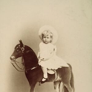 BOY ON ROCKING HORSE, 1890. Prince Oscar of Germany photographed in 1890