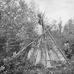 BURIAL TIPI, c1890. A tipi over the grave of a Crow chiefs wife. Photograph, c1890