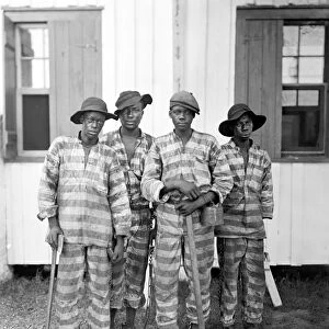 CHAIN GANG, c1905. A group of convicts on the chain gang, somewhere in the American South