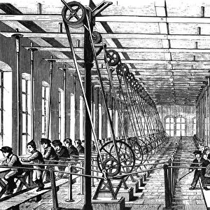 CHILD LABOR, 1845. Boys working in a German factory. Wood engraving, German, c1845