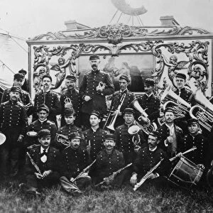 CIRCUS BAND, 1900. An American circus band and bandwagon, c1900