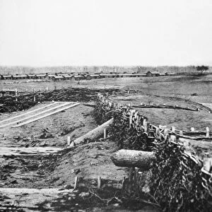 CIVIL WAR: QUAKER GUNS. Logs fashioned into decoy artillery, or so-called Quaker Guns, a successful ruse set up by Confederate forces at Centreville, Virginia. Photographed by George Barnard and James Gibson, March 1862