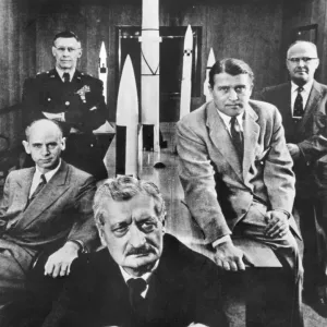 Black and white print of Hermann Oberth with officials