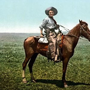 COWBOY, c1900. A cowboy on horseback in western America. Photochrome, c1900