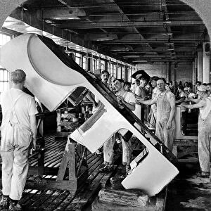 DETROIT: AUTO FACTORY, c1916. Building automobile bodies at a factory in Detroit, Michigan