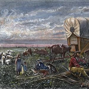 EMIGRANTS TO THE WEST. At evening camp: engraving, 19th century
