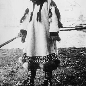 ESKIMO GIRL. Eskimo girl wearing traditional clothing