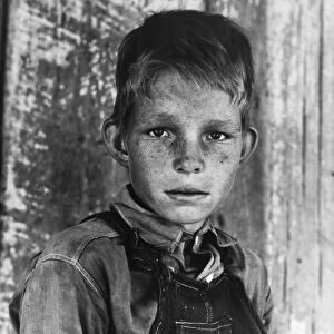 FARM BOY, 1937. Twelve year-old son of a cotton sharecropper near Cleveland, Mississippi