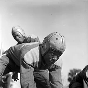 FOOTBALL TEAM, 1943. A football player from Bethune-Cookman College in Daytona Beach, Florida