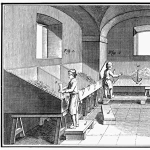 FRANCE: PAPER MANUFACTURE. Small boys cutting up rancid rags in an 18th century French paper mill. Line engraving, French, 18th century