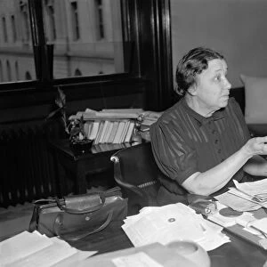 HATTIE CARAWAY (1878-1950). Senior senator from Arkansas. Photographed in her office
