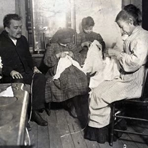 HINE: HOME INDUSTRY, 1910. Family of garment sewers working from their tenement