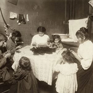 HINE: HOME INDUSTRY, 1911. A family making feathers late at night as the unemployed