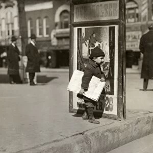 HINE: NEWSBOY, 1917. Five-year-old newsboy, Ernest Chester, at work in Oklahoma City, Oklahoma