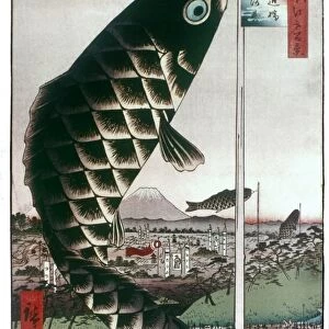 HIROSHIGE: KITES, 1857. Carp kites flown from masts. Color woodblock print from One Hundred Famous Views of Edo, by Utagawa Hiroshige, 1857