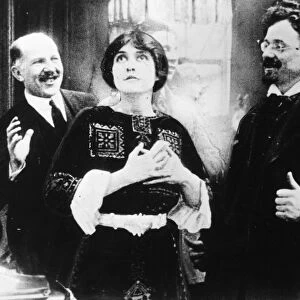 LEON TROTSKY (1879-1940). N Lev Davidovich Bronstein. Russian Communist leader. Trotsky, at right, as a movie extra in Brooklyn with Clara Kimball Young, prior to the Bolshevik Revolution