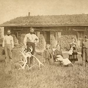 NEBRASKA: SETTLERS, c1886. Family of homesteaders, photographed outside of their
