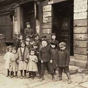NEW YORK: CHILDREN, 1910. Children posing in front of 36 Laight Street, New York City