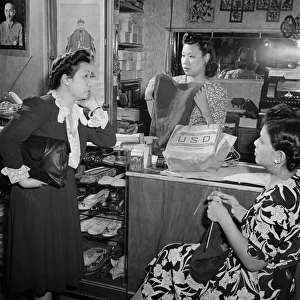 NEW YORK: CHINATOWN, 1942. Women in a gift shop in Chinatown, New York City