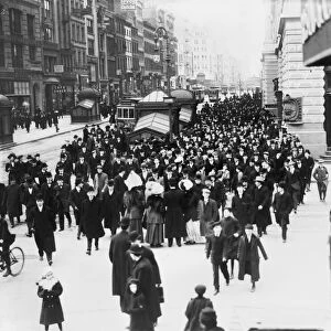 NEW YORK: SUFFRAGETTES. Suffragette protest march with crowds of onlookers on 23rd