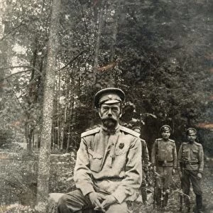 NICHOLAS II (1868-1918). Czar of Russia, 1894-1917. The former Czar detained at Tsarskoye Selo Palace, with his armed guards at right, 1917