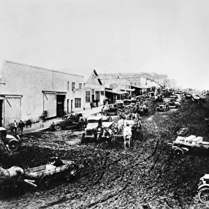 OIL: OKLAHOMA, 1926. Main Street in a town, possibly Bowlegs, in the Greater Seminole Oil Field