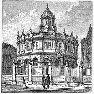 OXFORD: THEATRE. View of the Sheldonian Theatre on the campus of Oxford University, Oxford, England, designed by Sir Christopher Wren and completed in 1669. Wood engraving, English, c1885
