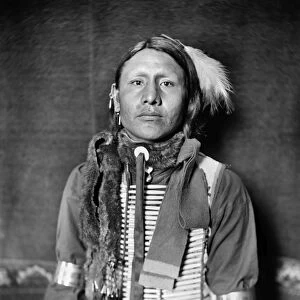SIOUX NATIVE AMERICAN, c1900. Has No Horses, a Sioux Native American from Buffalo Bills Wild West Show, wearing a breastplate. Photograph by Gertrude Kasebier, c1900