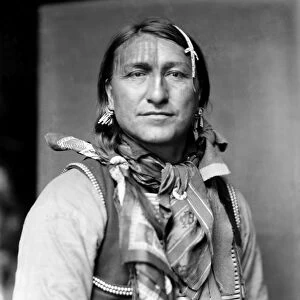 SIOUX NATIVE AMERICAN, c1900. Joe Black Fox, a Sioux Native American from Buffalo Bills Wild West Show. Photographed by Gertrude Kasebier, c1900