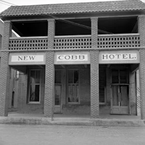 TEXAS: HOTEL, 1937. The New Cobb Hotel in Memphis, Texas. Photograph by Dorothea Lange